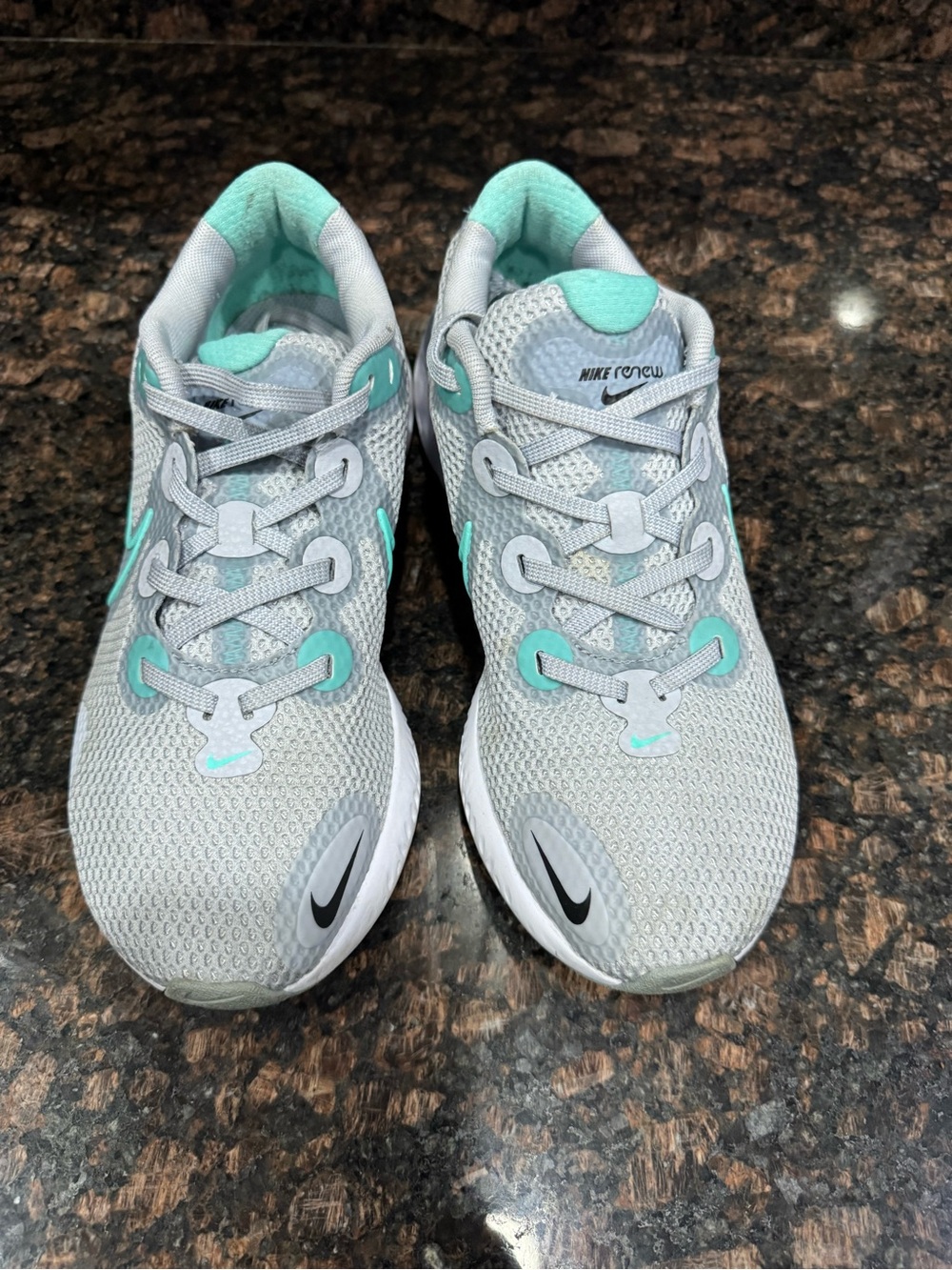 Nike Renew Women's Light Gray Running Sneakers with Teal Accents Size 7.5